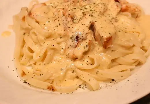 Toss Sauce with Fettuccine and Serve